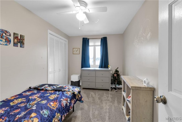 bedroom with a closet, ceiling fan, and carpet floors