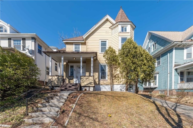 victorian home featuring a porch