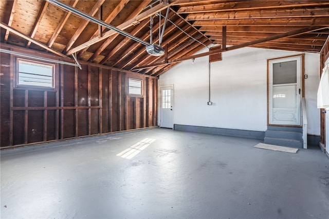 garage featuring a garage door opener