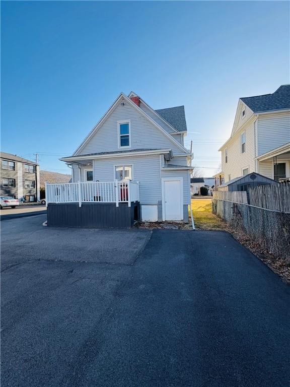 view of front of home with fence