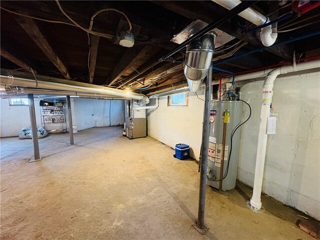 basement with heating unit and water heater