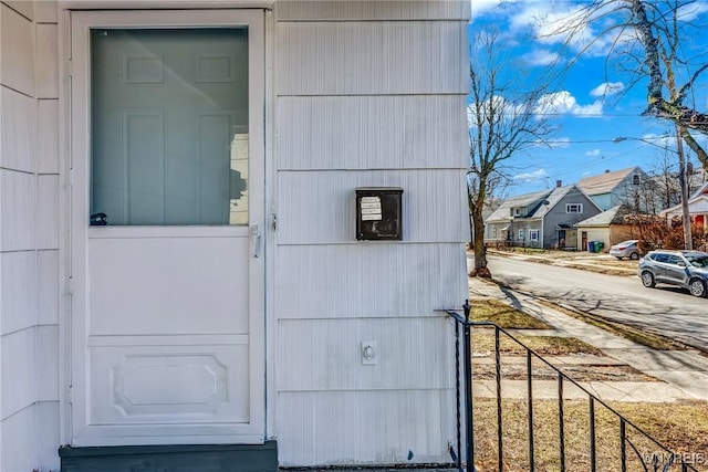 entrance to property with a residential view