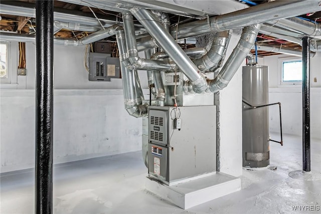 utility room with water heater and electric panel