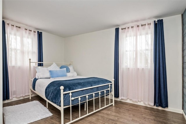 bedroom featuring wood finished floors