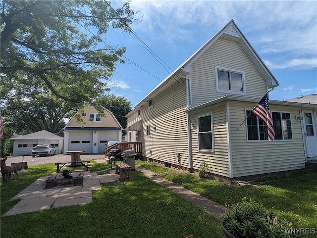 view of side of home featuring a lawn