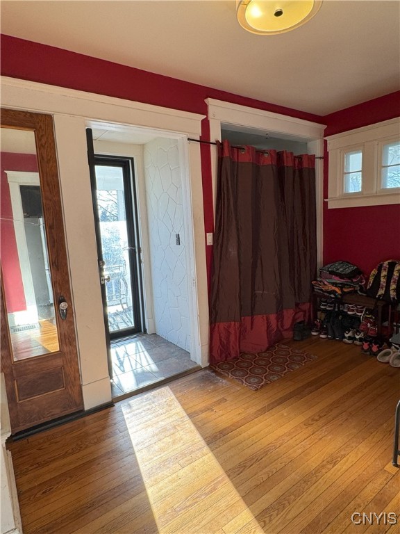 foyer entrance featuring light wood-style floors