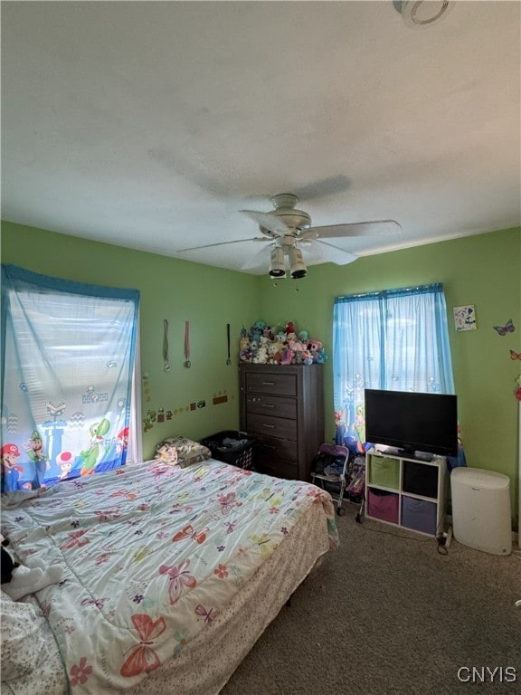 bedroom featuring carpet flooring and ceiling fan