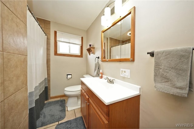 bathroom featuring tile patterned flooring, toilet, vanity, and a shower with curtain