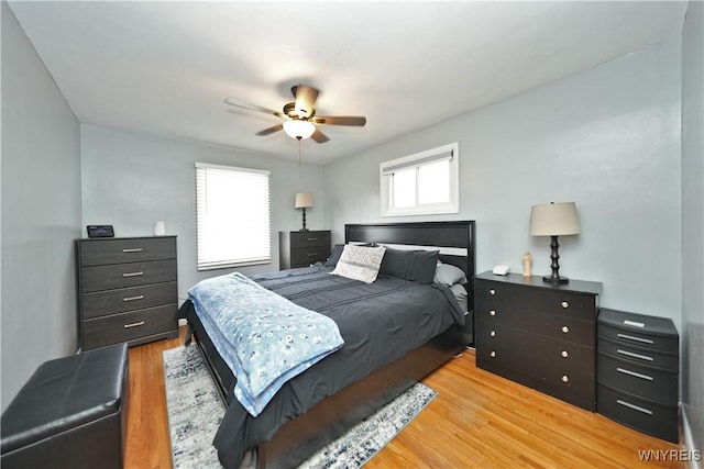 bedroom featuring a ceiling fan and light wood-style floors