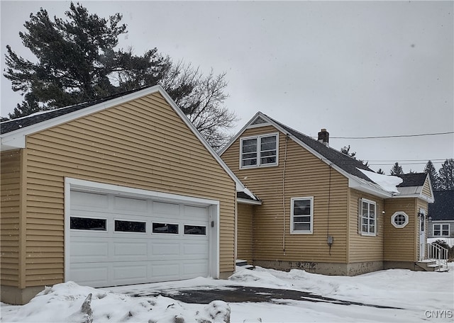 exterior space featuring an attached garage