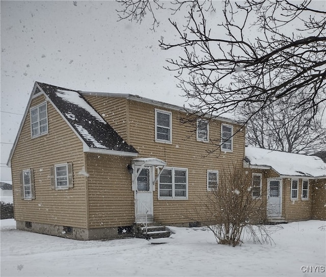 view of front facade featuring crawl space and entry steps