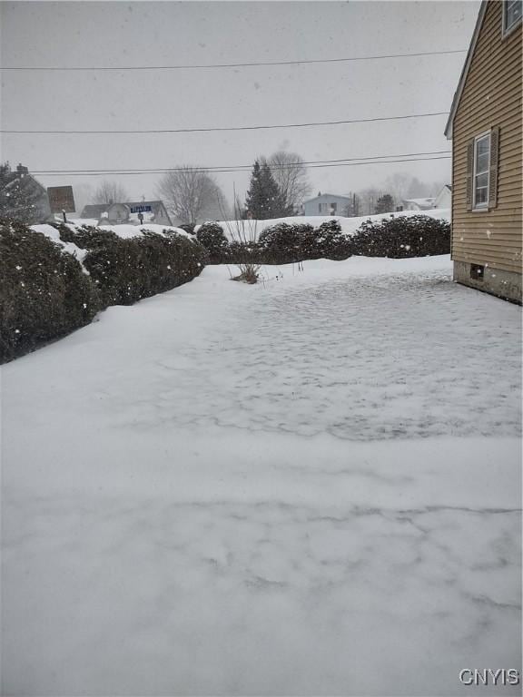 view of snowy yard