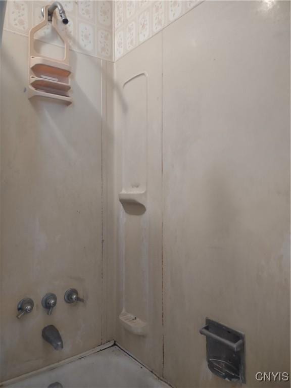 full bath featuring washtub / shower combination