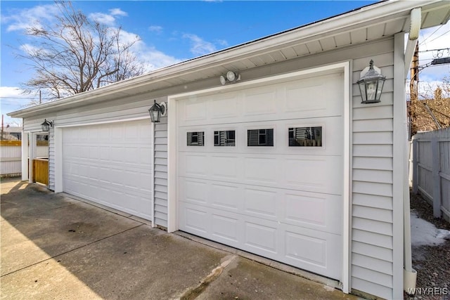 detached garage with fence