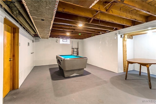 playroom with pool table and concrete flooring