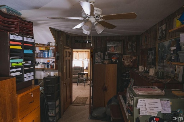 carpeted office with ceiling fan