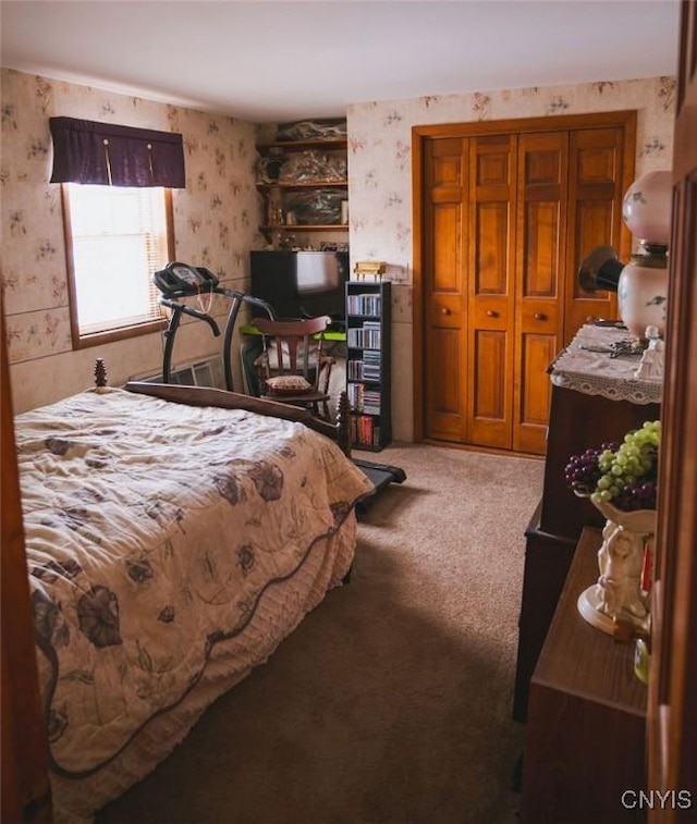 carpeted bedroom featuring wallpapered walls