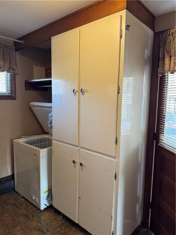 laundry area with a wealth of natural light