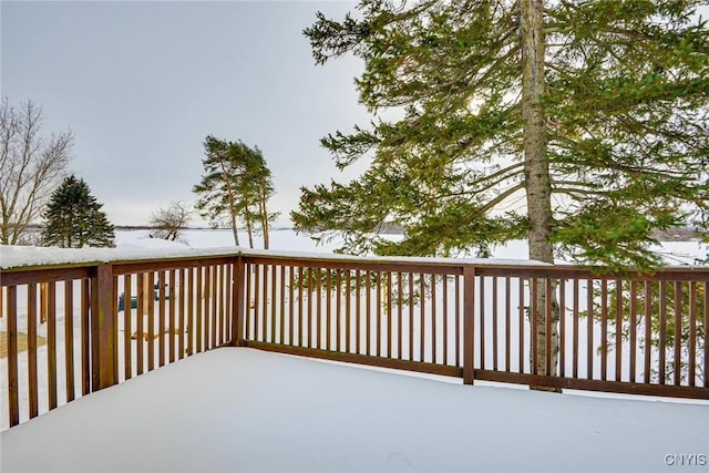 view of snow covered deck