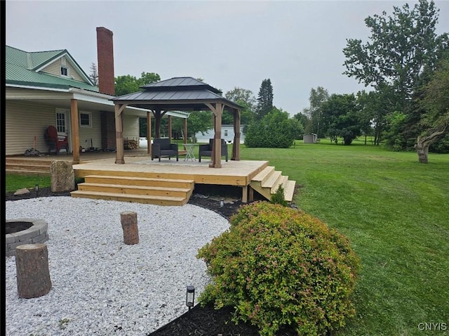 view of yard featuring a gazebo and a wooden deck