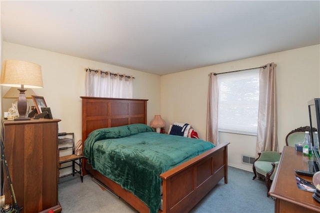 bedroom featuring visible vents and carpet