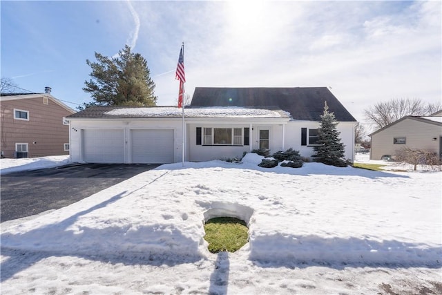 view of front facade featuring an attached garage and driveway