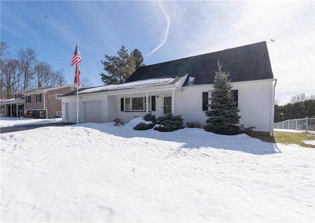 view of front of property featuring a garage