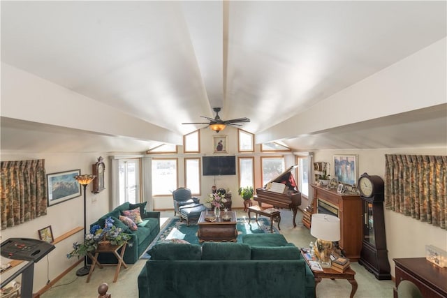 living area featuring light carpet, a ceiling fan, and lofted ceiling