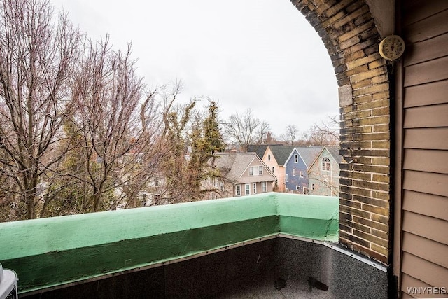 balcony featuring a residential view