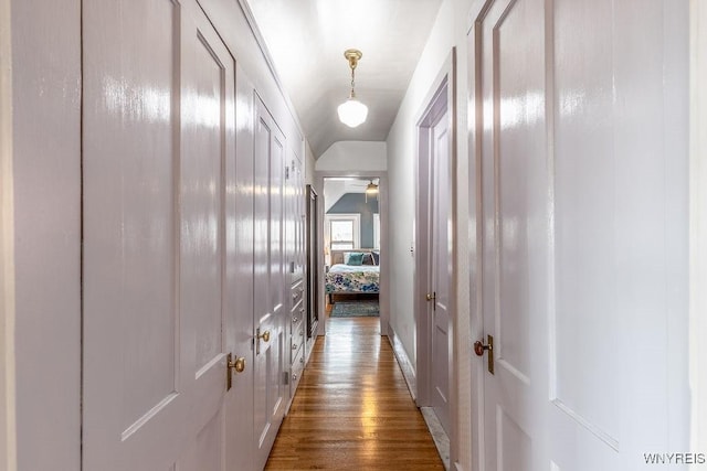 hall featuring wood finished floors