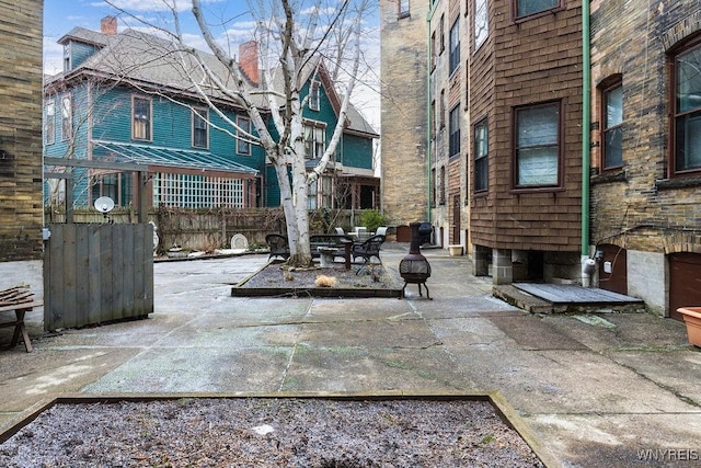 surrounding community featuring a patio area and fence