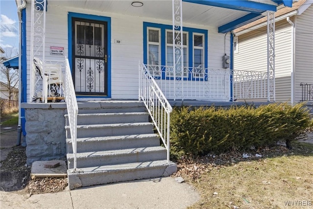 doorway to property with covered porch