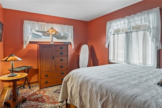 bedroom with baseboards