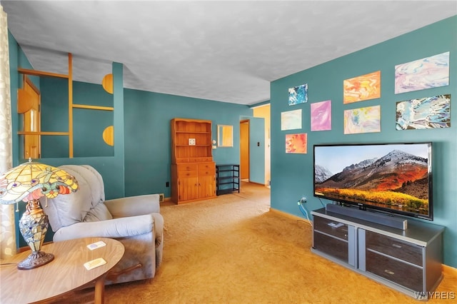 sitting room with carpet flooring