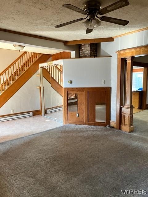 unfurnished living room with carpet flooring, a textured ceiling, stairs, and a baseboard radiator