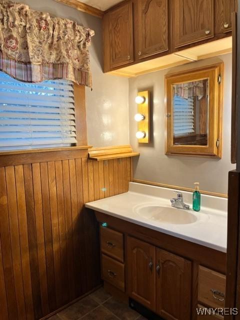 bathroom with vanity and tile patterned flooring