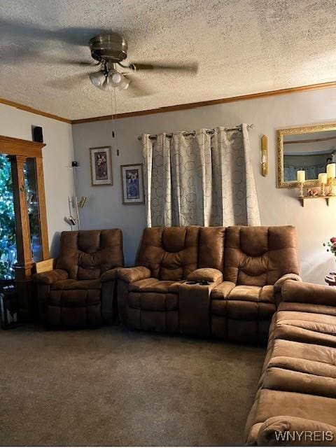 living area with carpet floors, a textured ceiling, ceiling fan, and crown molding