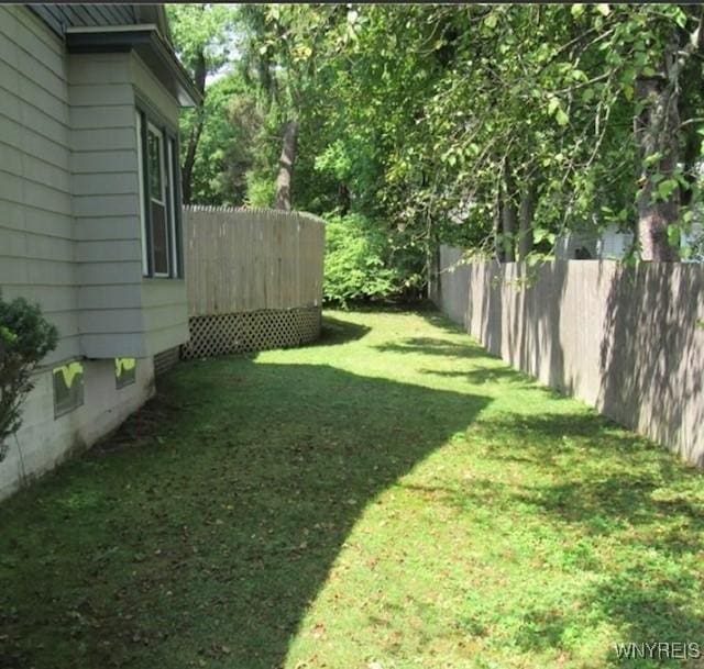 view of yard featuring fence