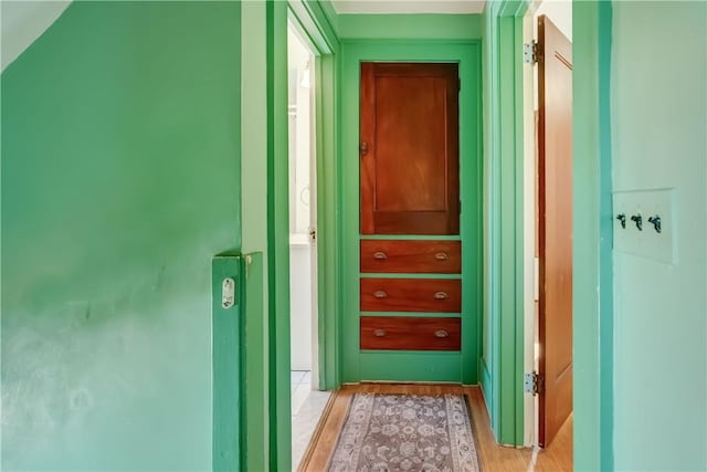 hallway featuring light wood finished floors