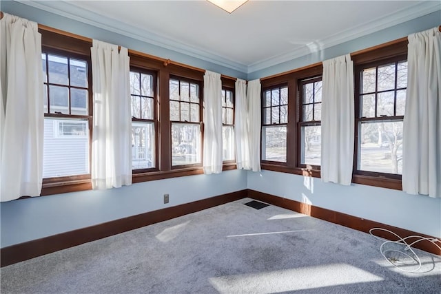 unfurnished sunroom featuring visible vents