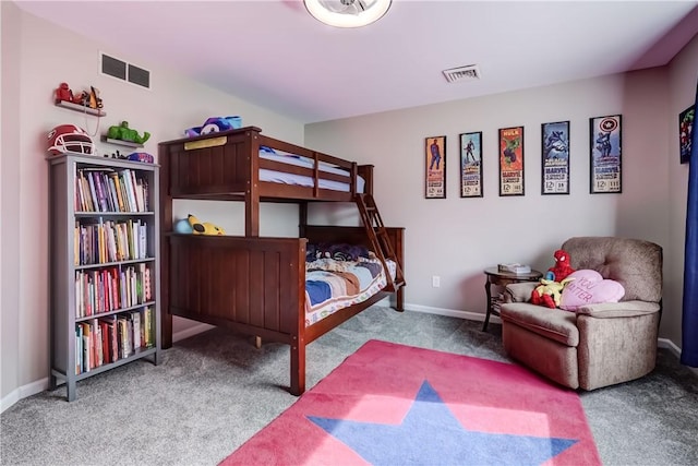 carpeted bedroom with baseboards and visible vents