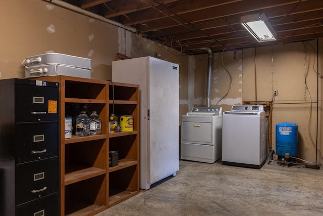 unfinished basement featuring washer and clothes dryer