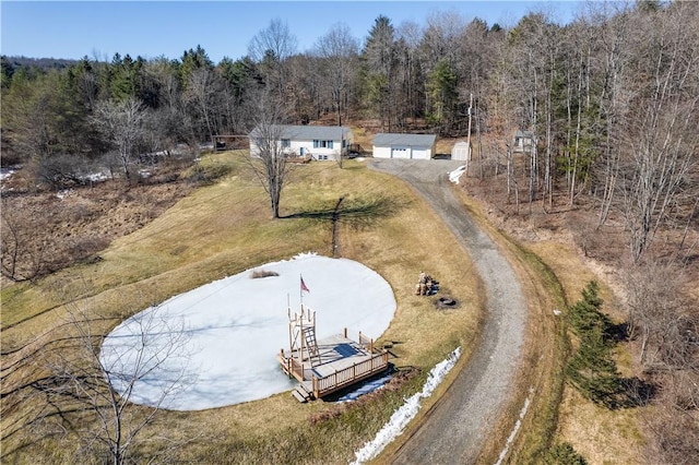 aerial view with a wooded view