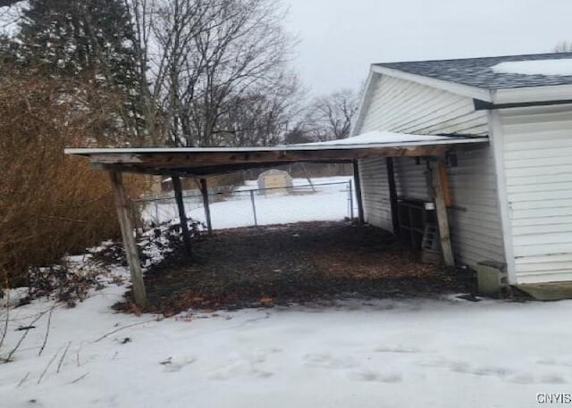 exterior space featuring a carport