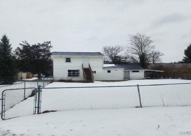 exterior space featuring a gate and fence