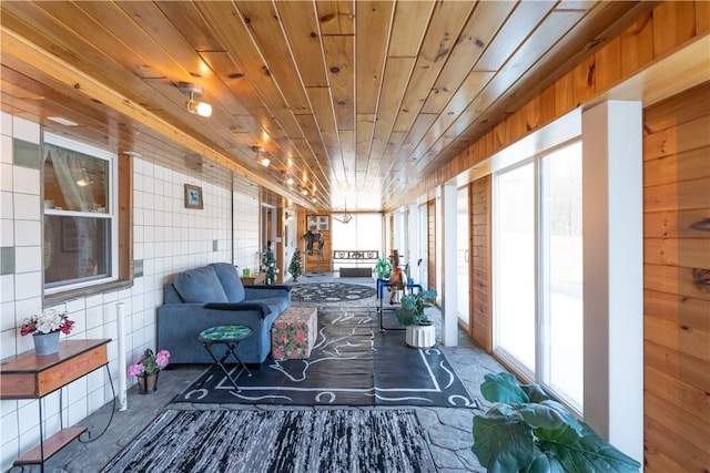 sunroom with wooden ceiling