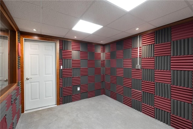 carpeted empty room featuring recessed lighting, wallpapered walls, and a paneled ceiling