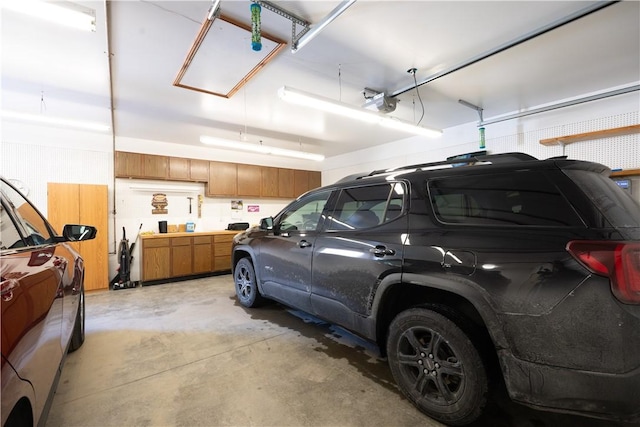 garage featuring a garage door opener