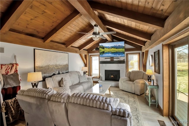 living area featuring light wood finished floors, a large fireplace, wood ceiling, and lofted ceiling with beams