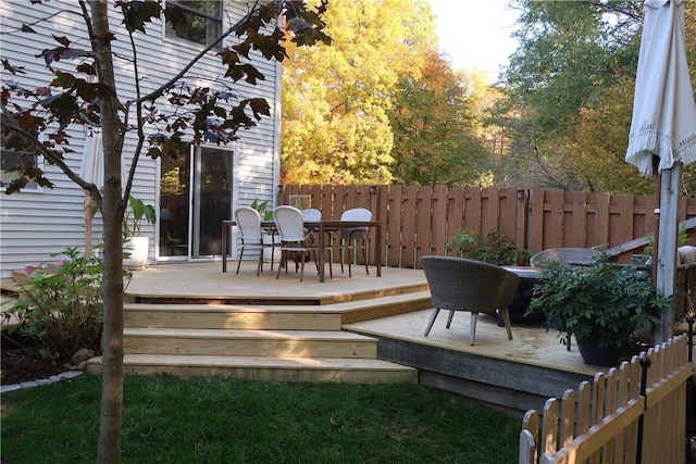 wooden deck featuring fence